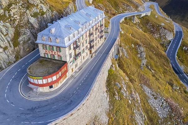 Aerial view of the Belvedere Hotel and the Furka Pass road, famous for a scene of the James Bond film Goldfinger, a high mountain pass in the Swiss Alps connecting Gletsch, Valais with Realp, Uri. Obergoms, Canton of Valais, Swiss Alps, Switzerland