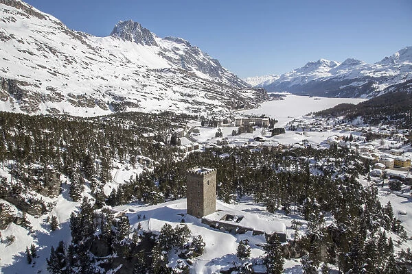 Aerial view of Belvedere tower of maloja with its village on the shores of Sils Lake