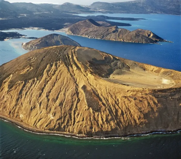 Framed Print : An aerial view of the caldera Sisale K'ma, which is 3, 937 feet in diameter and 300, 000 years old. It is situated at the inlet of Ghoubbet el Kharb (the Devil??s Throat), a region of high seismic activity where deep fractures in the lava continue Framed Print : An aerial view of the caldera Sisale K'ma, which is 3, 937 feet in diameter and 300, 000 years old. It is situated at the inlet of Ghoubbet el Kharb (the Devil??s Throat), a region of high seismic activity where deep fractures in the lava continue