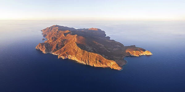 Aerial view of Capraia island at sunset, aerial view, Tuscan Archipelago National Park, Livorno province, Tuscany, Italy