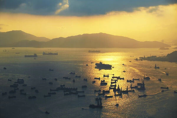 Aerial view of cargo ships with Lantau Island in the background, Hong Kong, China