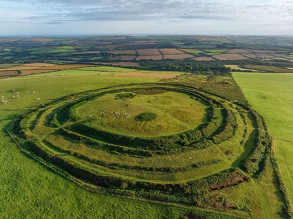 Aerial view of Castle an Dinas Iron Age Hillfort on Castle Downs near St Columb Major, Cornwall, England. Summer (August) 2023