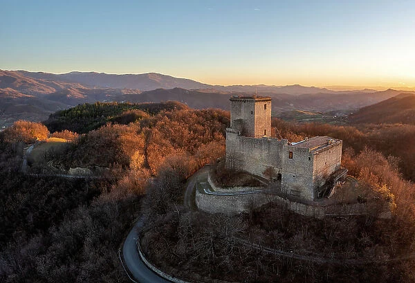 Aerial view of the castle of Oramala at sunset. Varzi, Oltrepo wine region, Oltrepo pavese, Lombardy, Italy