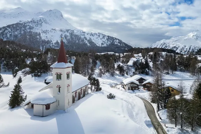 Framed Print : Aerial view of the Chiesa Bianca covered in snow. Maloja, Bregaglia, canton of Graubunden, Engadin, Switzerland Framed Print : Aerial view of the Chiesa Bianca covered in snow. Maloja, Bregaglia, canton of Graubunden, Engadin, Switzerland