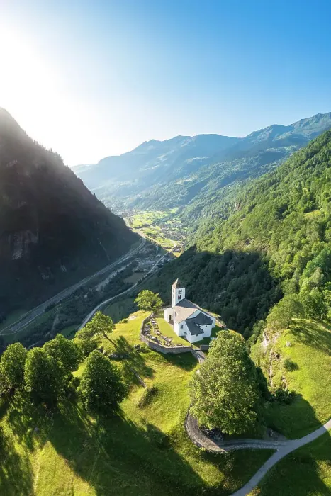 Framed Print : Aerial view of the church of Calonico, dominating Leventina valley towards San Gottardo pass. Calonico, district of Leventina, Canton of Ticino, Switzerland Framed Print : Aerial view of the church of Calonico, dominating Leventina valley towards San Gottardo pass. Calonico, district of Leventina, Canton of Ticino, Switzerland