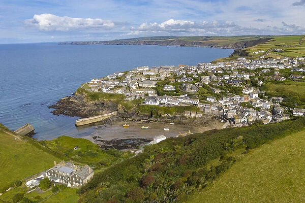 Aerial view of the Cornish fishing village of Port Isaac on the North coast of Cornwall, England. Autumn (September) 2021