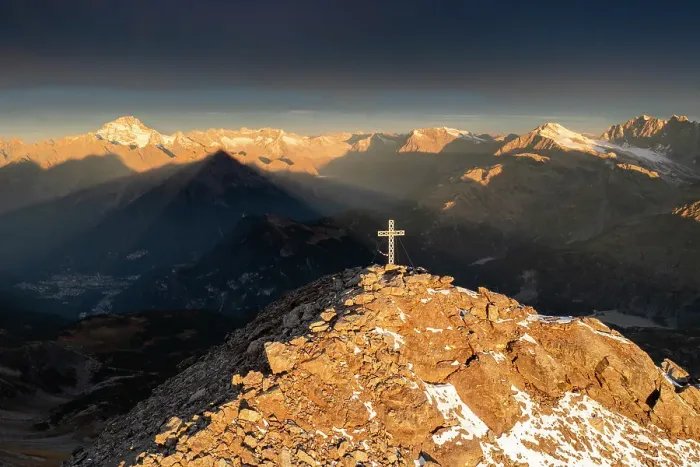 Framed Print : Aerial view of the crucifix on the top of Pizzo Scalino with view on the Mount Disgrazia at sunrise. Valmalenco, Valtellina, Lombardy, Italy Framed Print : Aerial view of the crucifix on the top of Pizzo Scalino with view on the Mount Disgrazia at sunrise. Valmalenco, Valtellina, Lombardy, Italy