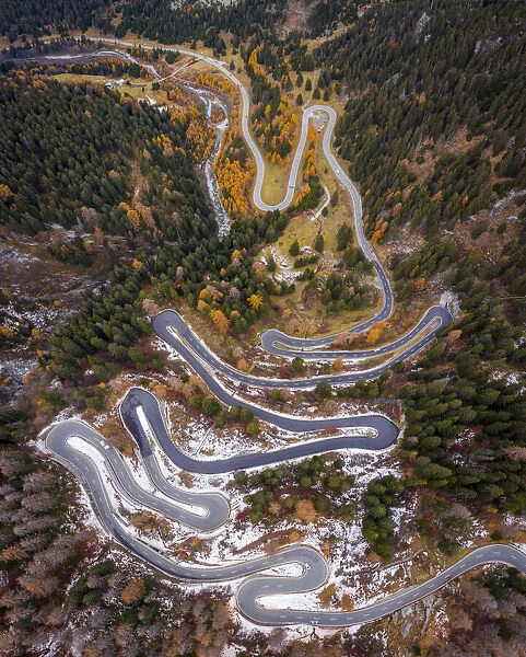 Aerial view of curves of Maloja Pass road in autumn, Bregaglia Valley, Graubunden, Engadine, Switzerland