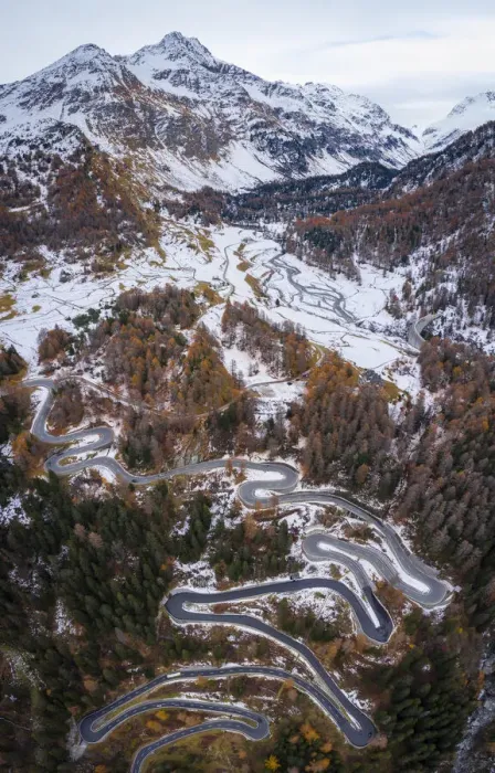 Framed Print : Aerial view of curves of Maloja Pass road and Piz da la Margna in autumn, Bregaglia Valley, Graubunden, Engadine, Switzerland Framed Print : Aerial view of curves of Maloja Pass road and Piz da la Margna in autumn, Bregaglia Valley, Graubunden, Engadine, Switzerland
