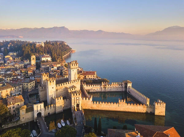 Aerial view at dawn of Sirmione village in Garda lake, Lombardy district