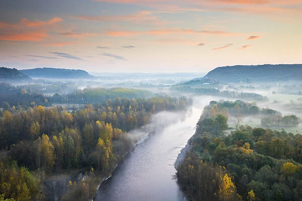 Aerial view of the Dordogne Valley & Dordogne river on a misty morning in autumn