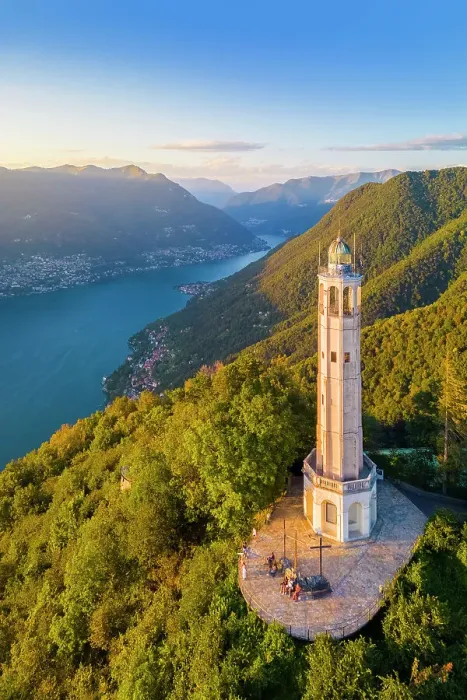 Framed Print : Aerial view of the Faro Voltiano (Volta Lighthouse) of Brunate overlooking Como and Como Lake in summer at sunset. Brunate, Province of Como, Lombardy, Italy Framed Print : Aerial view of the Faro Voltiano (Volta Lighthouse) of Brunate overlooking Como and Como Lake in summer at sunset. Brunate, Province of Como, Lombardy, Italy