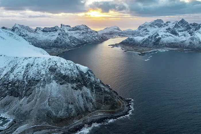 Framed Print : Aerial view of the fishing village of Vareid and Flakstad beach covered with snow at dawn, Lofoten Islands, Norway Framed Print : Aerial view of the fishing village of Vareid and Flakstad beach covered with snow at dawn, Lofoten Islands, Norway
