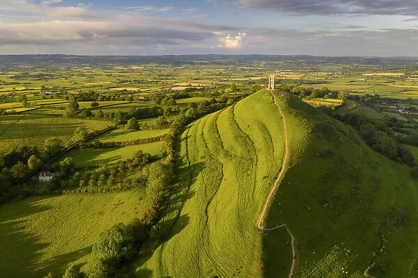 Aerial view of Glastonbury on a sunny summer evening, Somerset, England