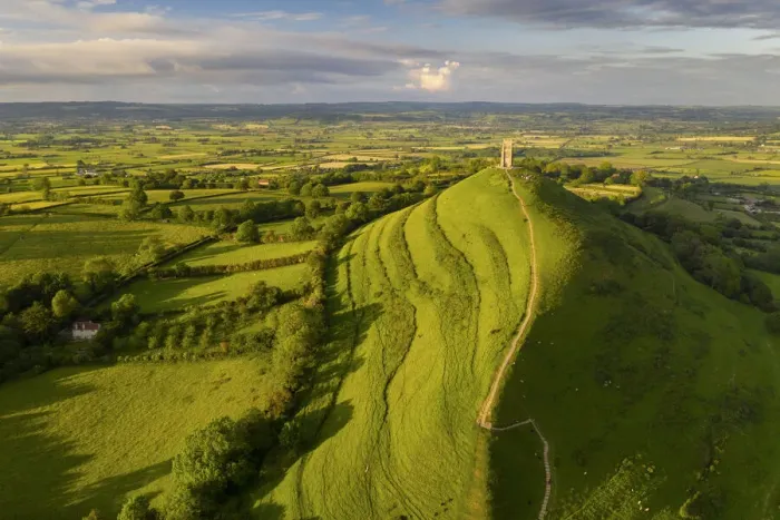 Framed Print : Aerial view of Glastonbury on a sunny summer evening, Somerset, England Framed Print : Aerial view of Glastonbury on a sunny summer evening, Somerset, England