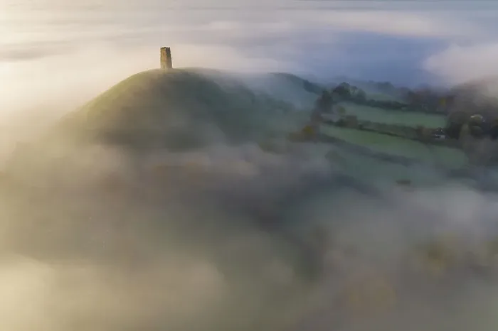 Framed Print : Aerial view of Glastonbury Tor on a beautiful misty autumn morning, Glastonbury, Somerset, England. Autumn (November) 2022 Framed Print : Aerial view of Glastonbury Tor on a beautiful misty autumn morning, Glastonbury, Somerset, England. Autumn (November) 2022