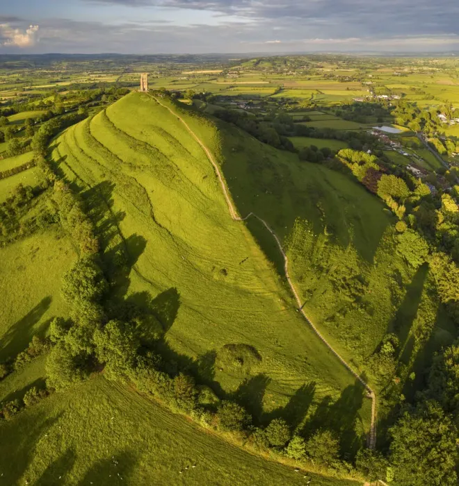 Framed Print : Aerial view of Glastonbury Tor and St Michaels Tower, Somerset, England Framed Print : Aerial view of Glastonbury Tor and St Michaels Tower, Somerset, England