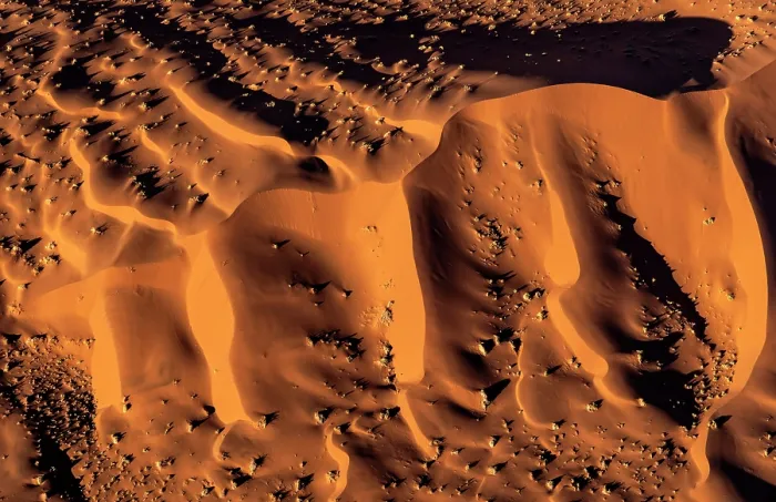 Framed Print : Aerial view of golden sand dunes at sunrise, Sossusvlei, Namib-Naukluft National Park, Namib Desert, Namibia Framed Print : Aerial view of golden sand dunes at sunrise, Sossusvlei, Namib-Naukluft National Park, Namib Desert, Namibia