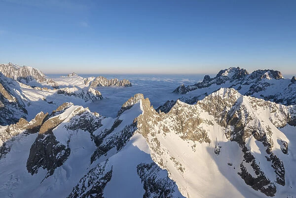 Aerial view of Grandes Jorasses of Mont Blanc during sunrise, Courmayeur, Aosta Valley
