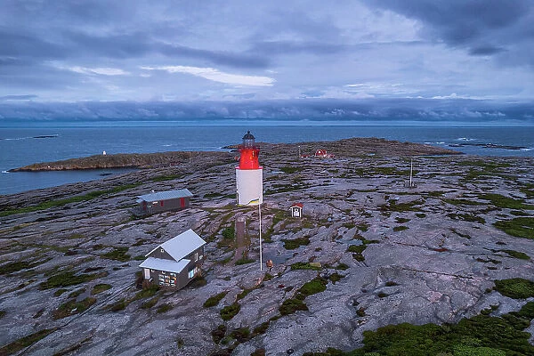 Aerial view of Hallo island with the lighthouse, dusk time, Smogen, Bohuslan, Sotenas municipality, Vastra Gotaland, West Sweden, Sweden