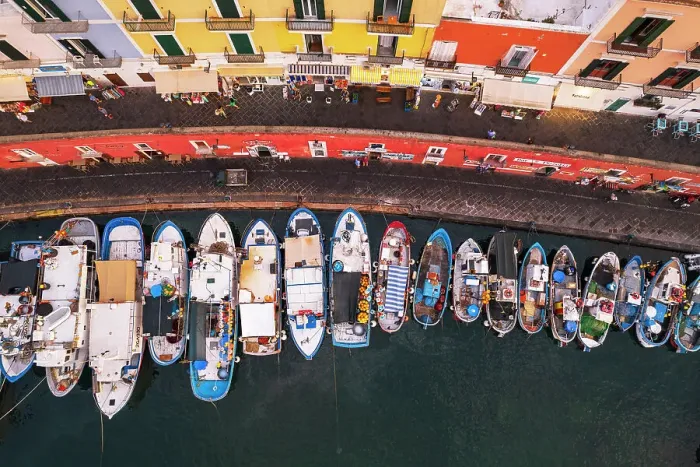 Framed Print : Aerial view of the harbour of Ponza with colorful facades and fishing vessels, Ponza island, Pontine islands, Latium, Italy Framed Print : Aerial view of the harbour of Ponza with colorful facades and fishing vessels, Ponza island, Pontine islands, Latium, Italy