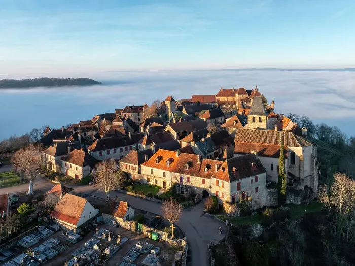 Framed Print : Aerial view of the hilltop village of Loubressac above the fog, Loubressac, Lot, Occitanie, France