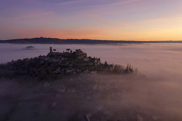 An aerial view of the hilltop village of Turenne at sunrise, Correze, Limousin