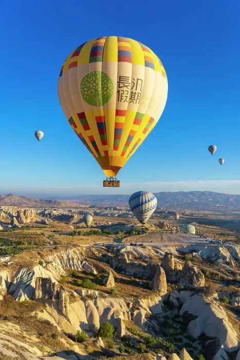 Framed Print : Aerial view of hot air balloon over rock formations at sunrise, Goreme, Goreme Historical National Park, Nevsehir District, Nevsehir Province, UNESCO, Cappadocia, Central Anatolia Region, Turkey Framed Print : Aerial view of hot air balloon over rock formations at sunrise, Goreme, Goreme Historical National Park, Nevsehir District, Nevsehir Province, UNESCO, Cappadocia, Central Anatolia Region, Turkey