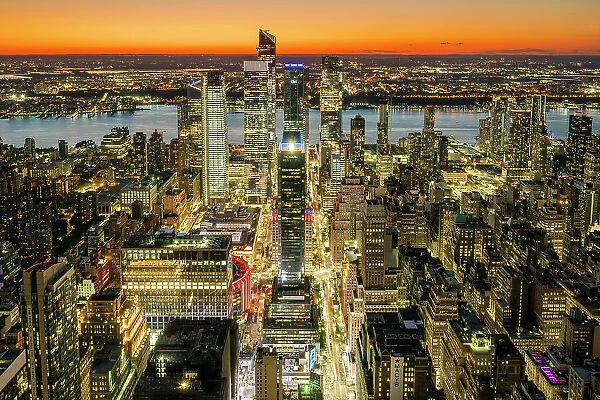 Aerial view of Hudson Yards and Midtown Manhattan skyline at sunset, New York, USA