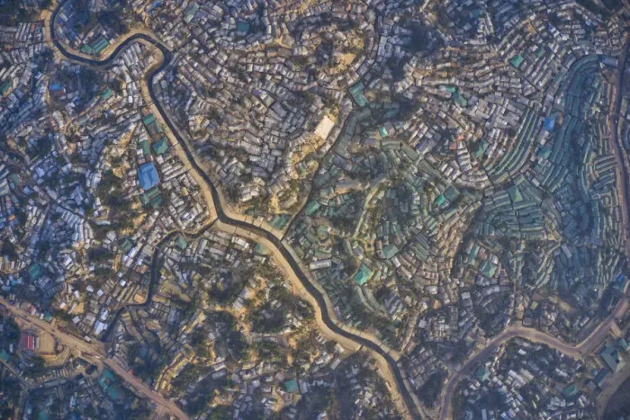 Framed Print : Aerial view of a huge refugee camp with makeshift houses near Myanmar border Framed Print : Aerial view of a huge refugee camp with makeshift houses near Myanmar border