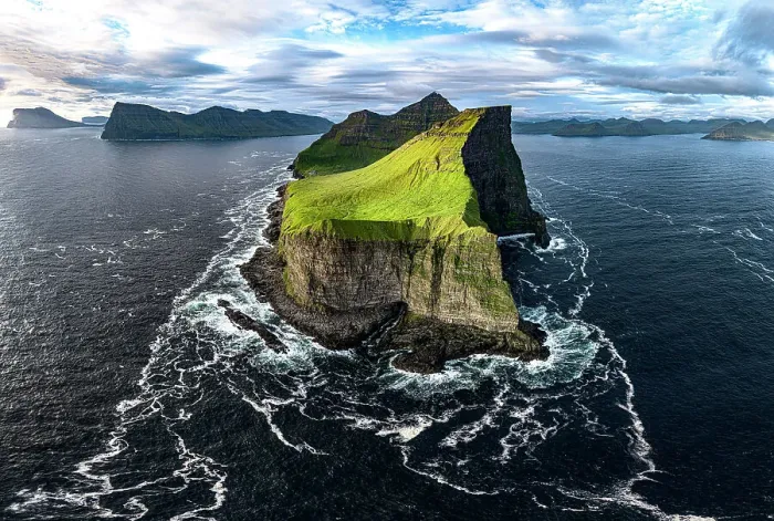 Framed Print : Aerial view of Kallur lighthouse on top of grass covered cliffs overlooking the rippled sea, Kalsoy island, Faroe Islands Framed Print : Aerial view of Kallur lighthouse on top of grass covered cliffs overlooking the rippled sea, Kalsoy island, Faroe Islands