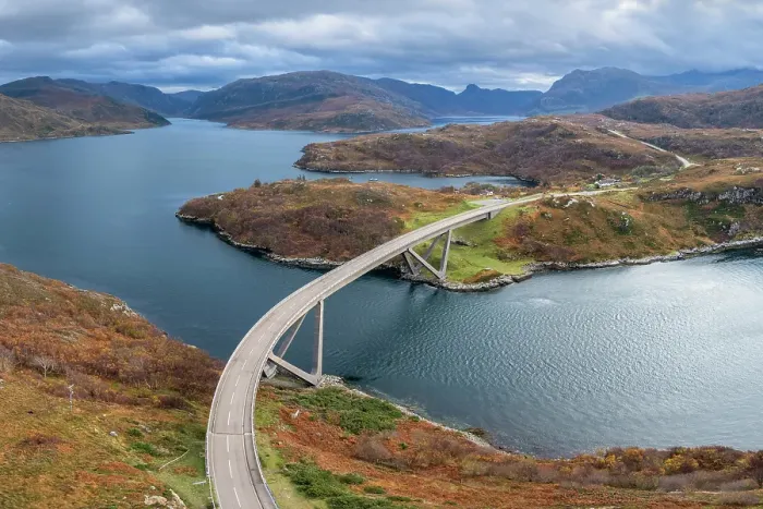 Framed Print : Aerial view of Kylesku Bridge on the scenic North Cost 500 driving route, crossing Loch a Chairn Bhain in Sutherland, Scotland, UK Framed Print : Aerial view of Kylesku Bridge on the scenic North Cost 500 driving route, crossing Loch a Chairn Bhain in Sutherland, Scotland, UK