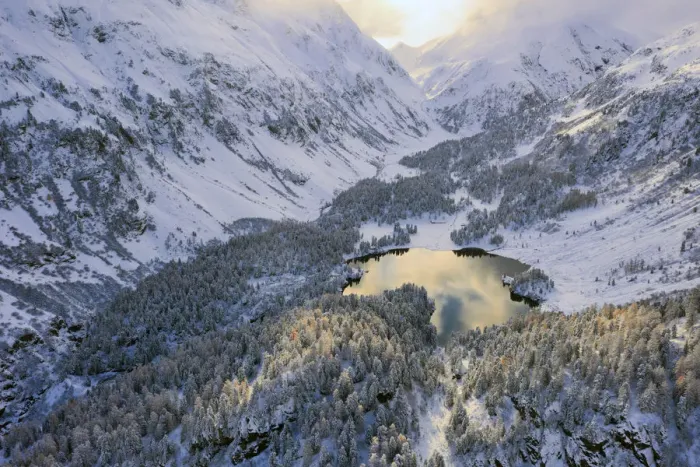 Framed Print : Aerial view of Lake Cavloc after an autumn snowfall, Maloja Pass, Bregaglia Valley Framed Print : Aerial view of Lake Cavloc after an autumn snowfall, Maloja Pass, Bregaglia Valley