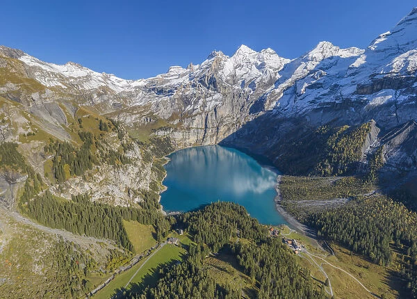 Aerial view on Lake Oeschinen with Blumlisalp mountain range, Kandersteg, Berner Oberland, Switzerland