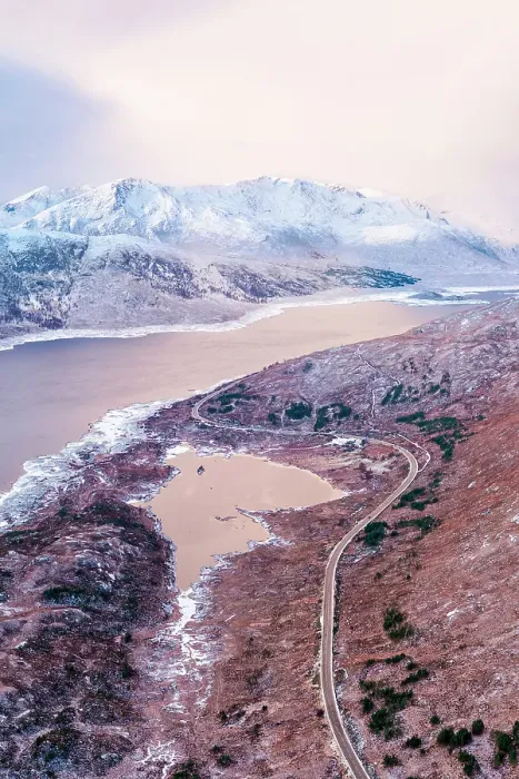 Framed Print : Aerial view over Loch Cuaich along the north coast 500 driving route, A87 between Fort William and the Isle of Skye. Sutherland, Highlands, Scotland, United Kingdom