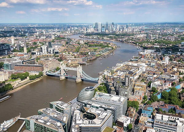 The aerial view of London towards Tower Bridge and Canary Wharf, London, England