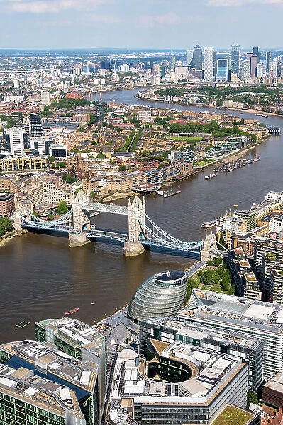 The aerial view of London towards Tower Bridge and Canary Wharf, London, England