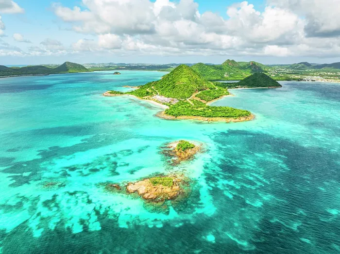 Framed Print : Aerial view of lush green headland of Pearns Point overlooking a coral reef, Antigua, Antigua & Barbuda, Caribbean, West Indies Framed Print : Aerial view of lush green headland of Pearns Point overlooking a coral reef, Antigua, Antigua & Barbuda, Caribbean, West Indies