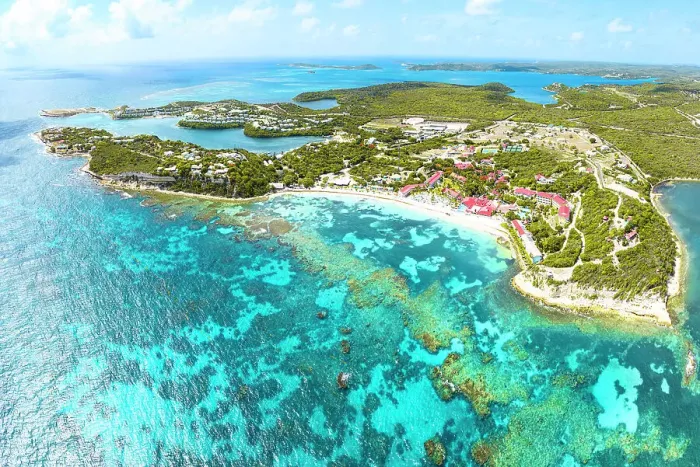 Framed Print : Aerial view of a luxury resort on idyllic beach by coral reef, Long Bay, Antigua, Antigua & Barbuda, Caribbean, West Indies Framed Print : Aerial view of a luxury resort on idyllic beach by coral reef, Long Bay, Antigua, Antigua & Barbuda, Caribbean, West Indies