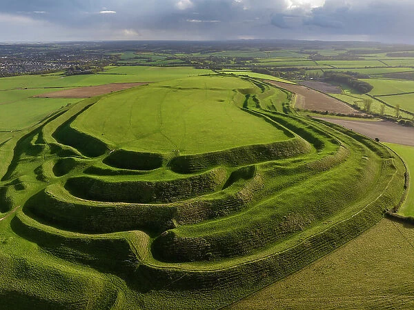 Aerial view of Maiden Castle, the largest Iron Age Hillfort in Britain near Dorchester, Dorset, England. Autumn (October) 2023