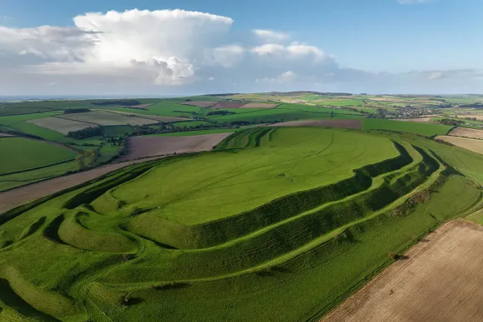 Framed Print : Aerial view of Maiden Castle, the largest Iron Age Hillfort in Britain near Dorchester, Dorset, England. Autumn (October) 2023 Framed Print : Aerial view of Maiden Castle, the largest Iron Age Hillfort in Britain near Dorchester, Dorset, England. Autumn (October) 2023