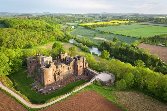 Framed Print : Aerial view of the medieval ruins of Goodrich Castle above the River Wye, Herefordshire, England. Spring (May) 2022
