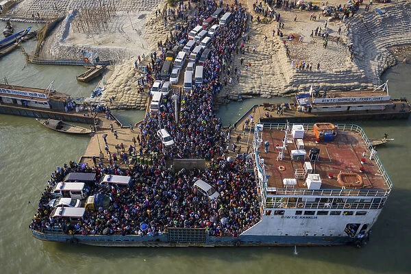 Aerial view of millions of people rush to board a ferry with their belongings to get home