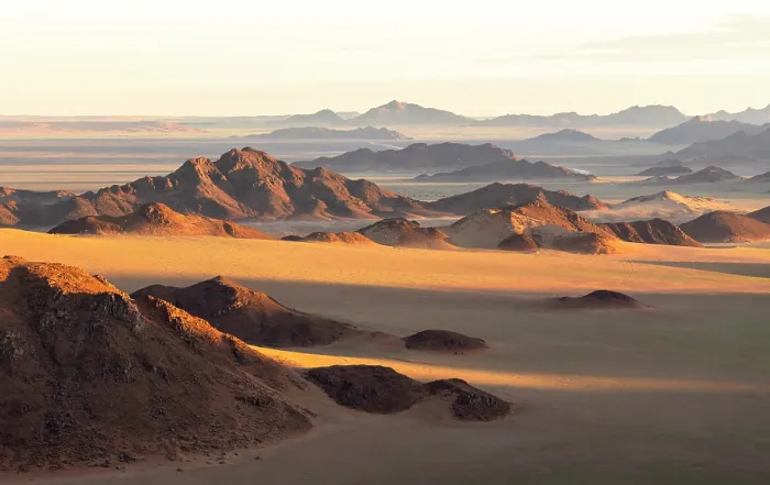 Framed Print : Aerial view of mountains and desert plains, Namib-Naukluft National Park, Namib Desert, Namibia Framed Print : Aerial view of mountains and desert plains, Namib-Naukluft National Park, Namib Desert, Namibia