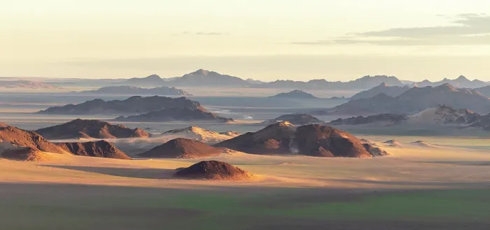 Framed Print : Aerial view of mountains and desert plains, Namib-Naukluft National Park, Namib Desert, Namibia Framed Print : Aerial view of mountains and desert plains, Namib-Naukluft National Park, Namib Desert, Namibia