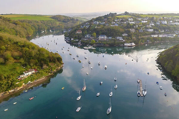 Aerial view of Newton Ferrers and the River Yealm estuary, South Hams, Devon, England. Spring (April) 2022