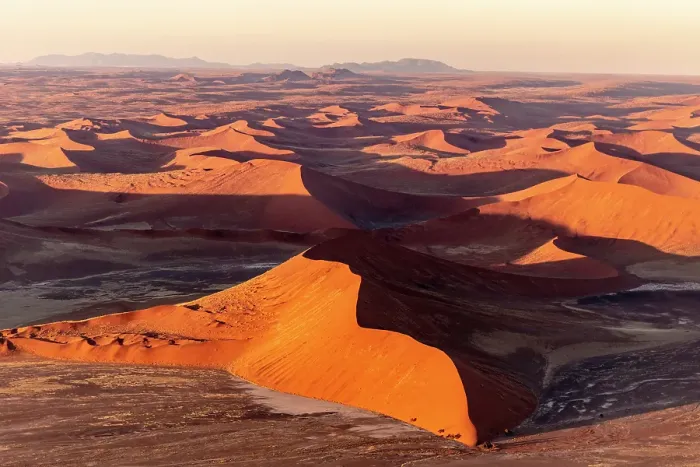 Framed Print : Aerial view of orange sand dunes from helicopter, Sossusvlei, Namib-Naukluft National Park, Namib Desert, Namibia Framed Print : Aerial view of orange sand dunes from helicopter, Sossusvlei, Namib-Naukluft National Park, Namib Desert, Namibia