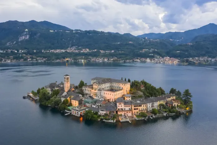 Framed Print : Aerial view of Orta San Giulio and Lake Orta at blu hour before a storm. Orta Lake Framed Print : Aerial view of Orta San Giulio and Lake Orta at blu hour before a storm. Orta Lake
