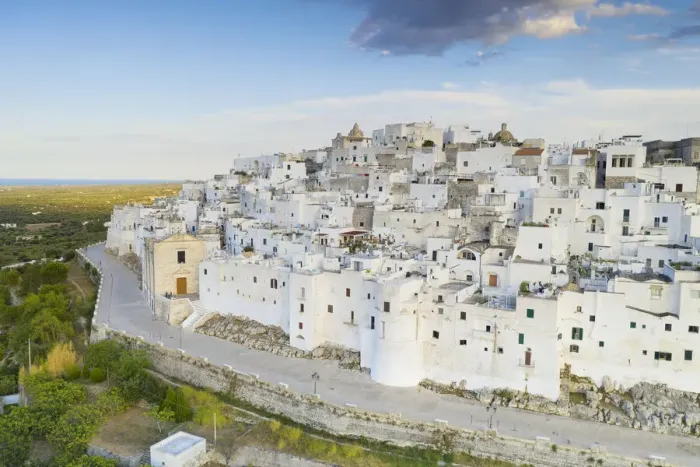 Framed Print : aerial view of Ostuni, so called the white city, during a summer sunset Framed Print : aerial view of Ostuni, so called the white city, during a summer sunset