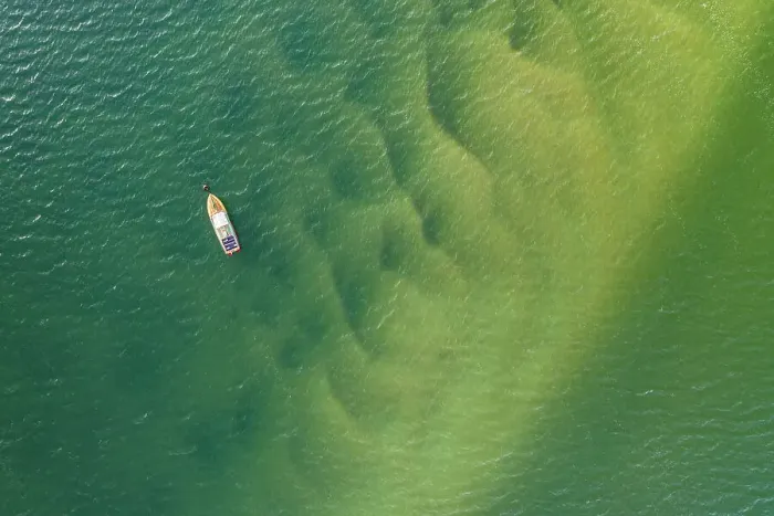 Framed Print : Aerial view of Padstow speedboat Fireball moored in the Camel Estuary, Padstow, Cornwall, England. Spring (April) 2022 Framed Print : Aerial view of Padstow speedboat Fireball moored in the Camel Estuary, Padstow, Cornwall, England. Spring (April) 2022
